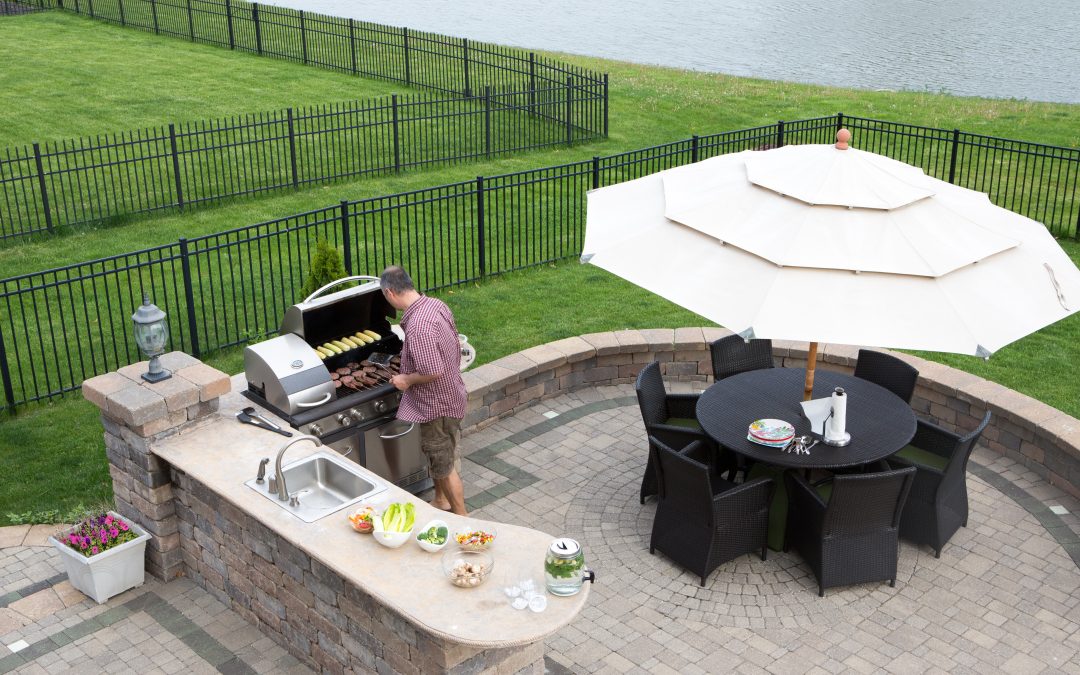 Entertain Year-Round with an Outdoor Kitchen and Fireplace Omaha, NE Homeowners Love